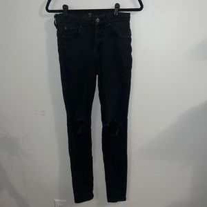 7 For All Mankind “the skinny” black ripped jeans